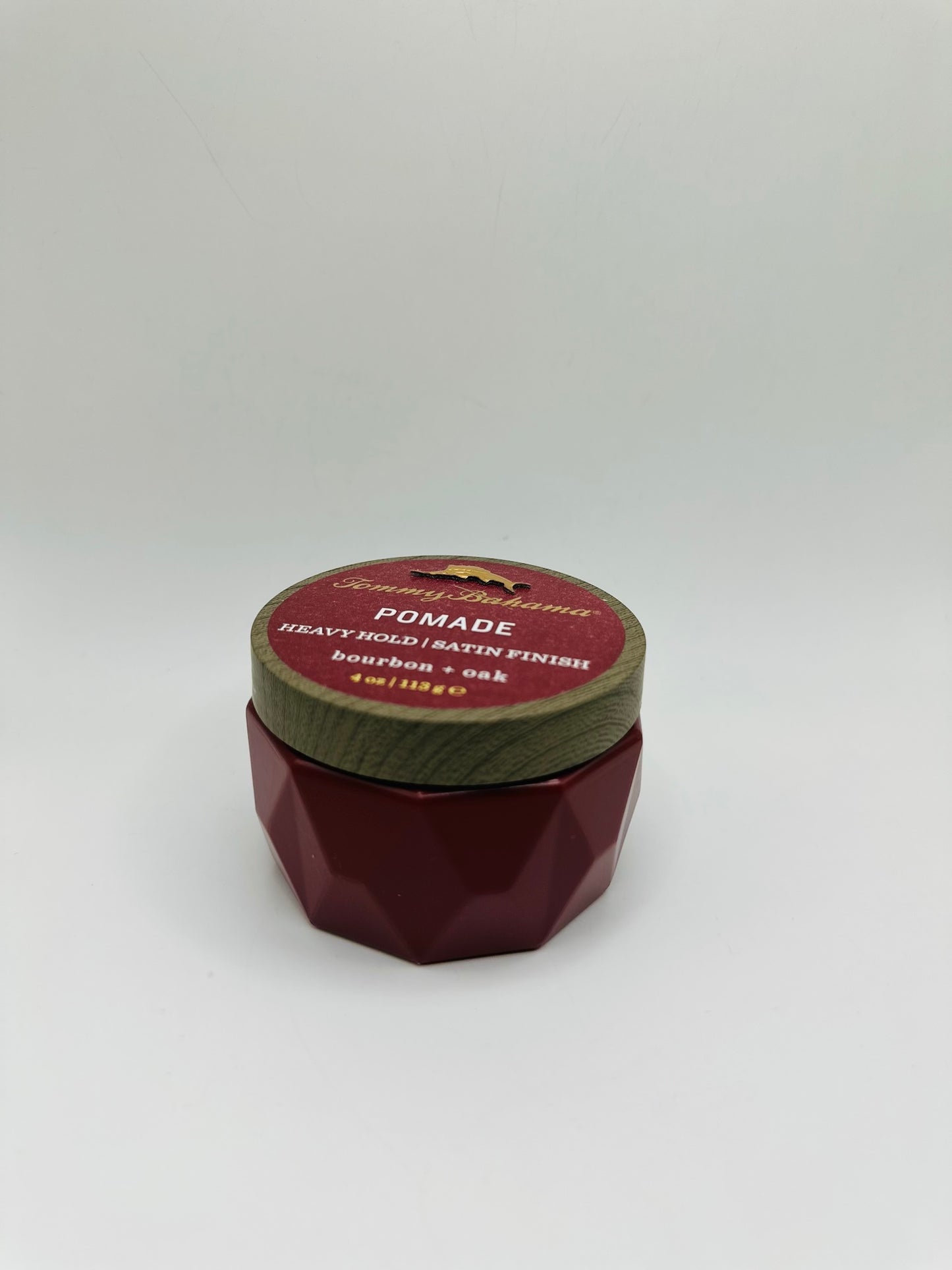 Tommy Bahama Heavy Hold Satin Finish Pomade, scented with bourbon and oak