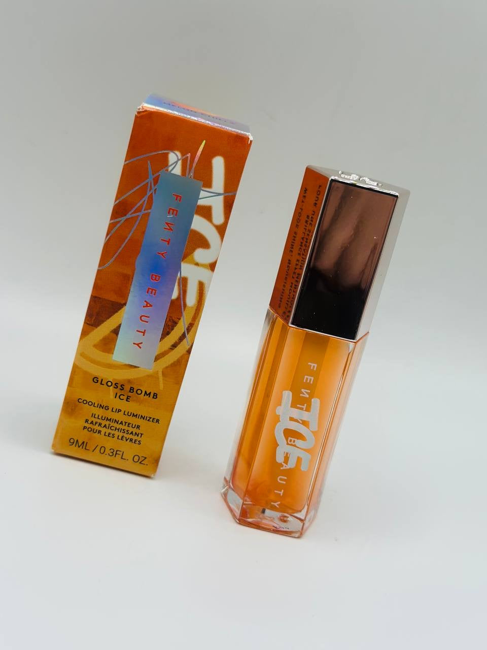 Fenty beauty gloss bomb ice shade melon chillz