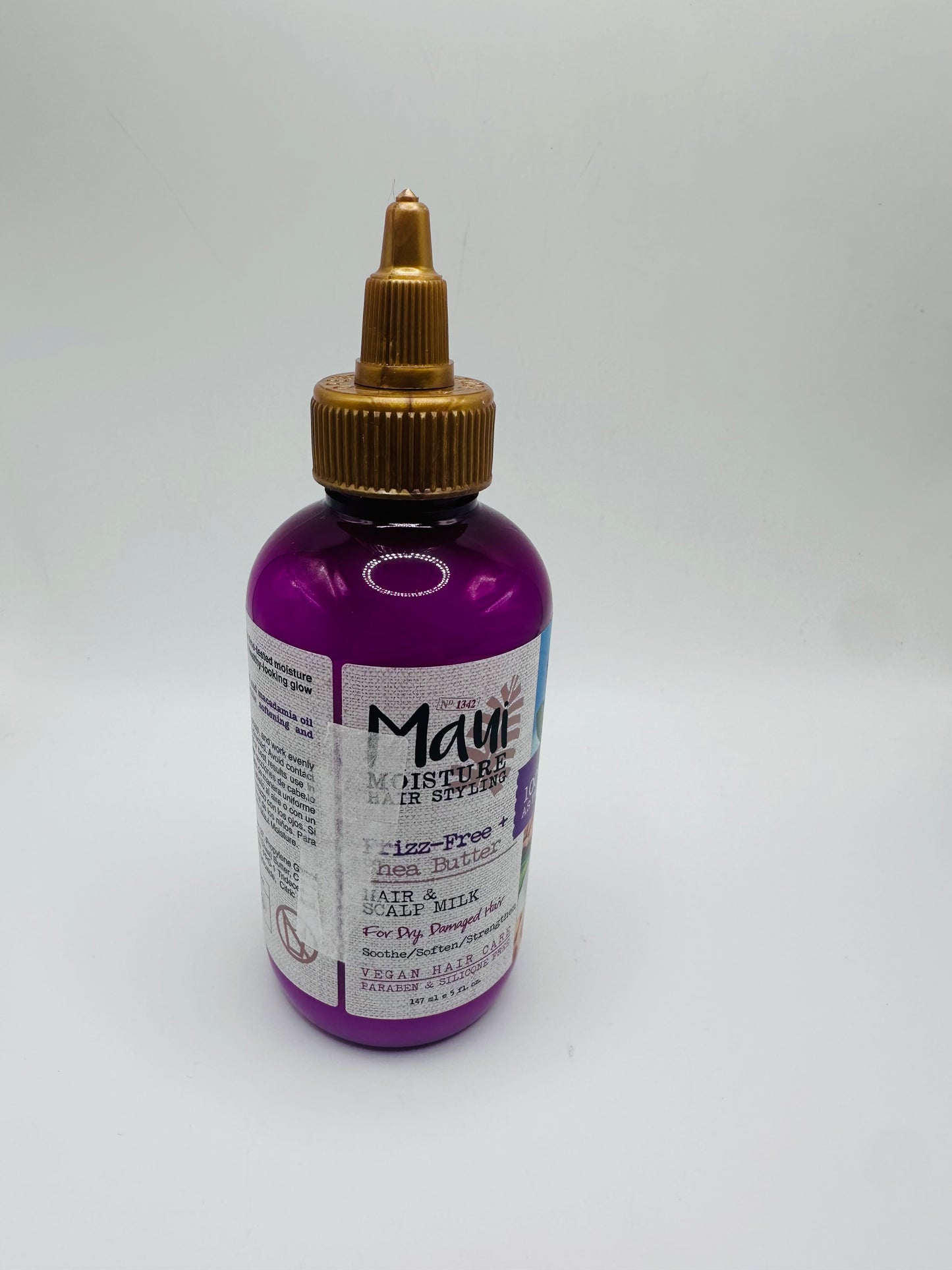 Maui Nui Shea Butter Hair & Dry Scalp Milk, which is a hydrating hair and scalp treatment