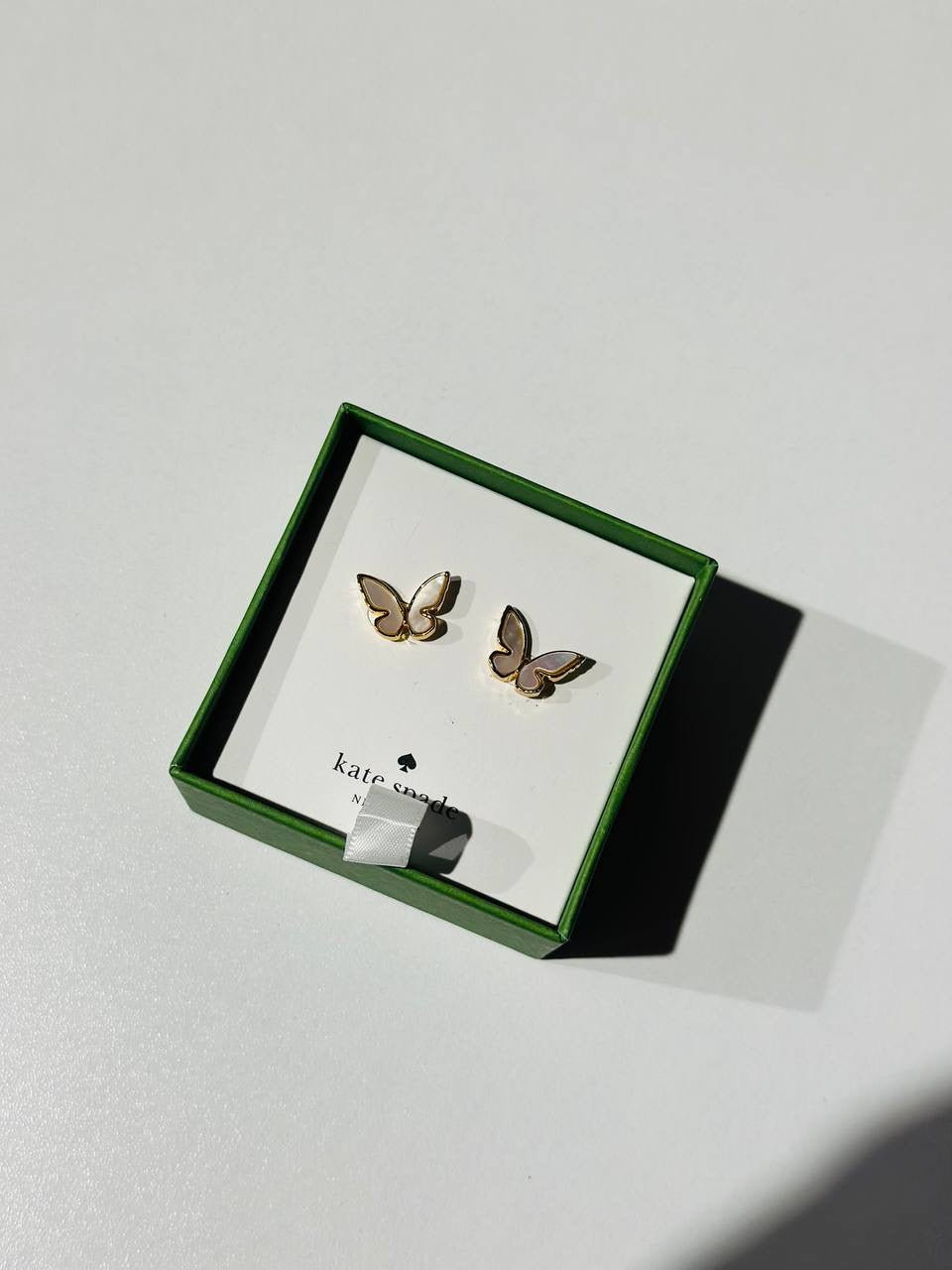 Kate Spade Social Butterfly stud earrings with mother-of-pearl inlay