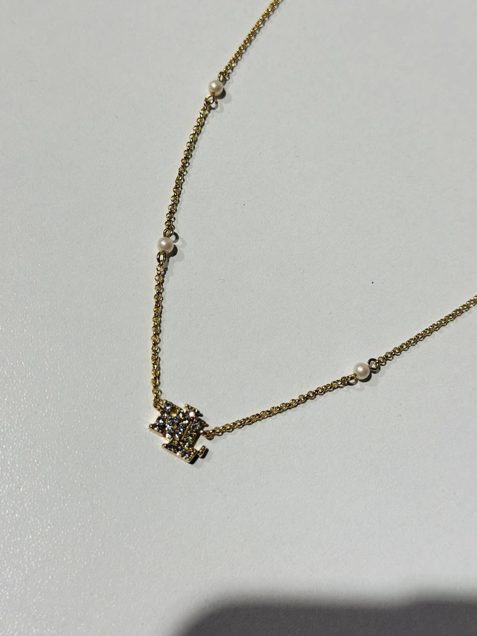 Ralph Lauren gold-toned necklace with pearls and a crystal-embellished "LRL" logo pendant