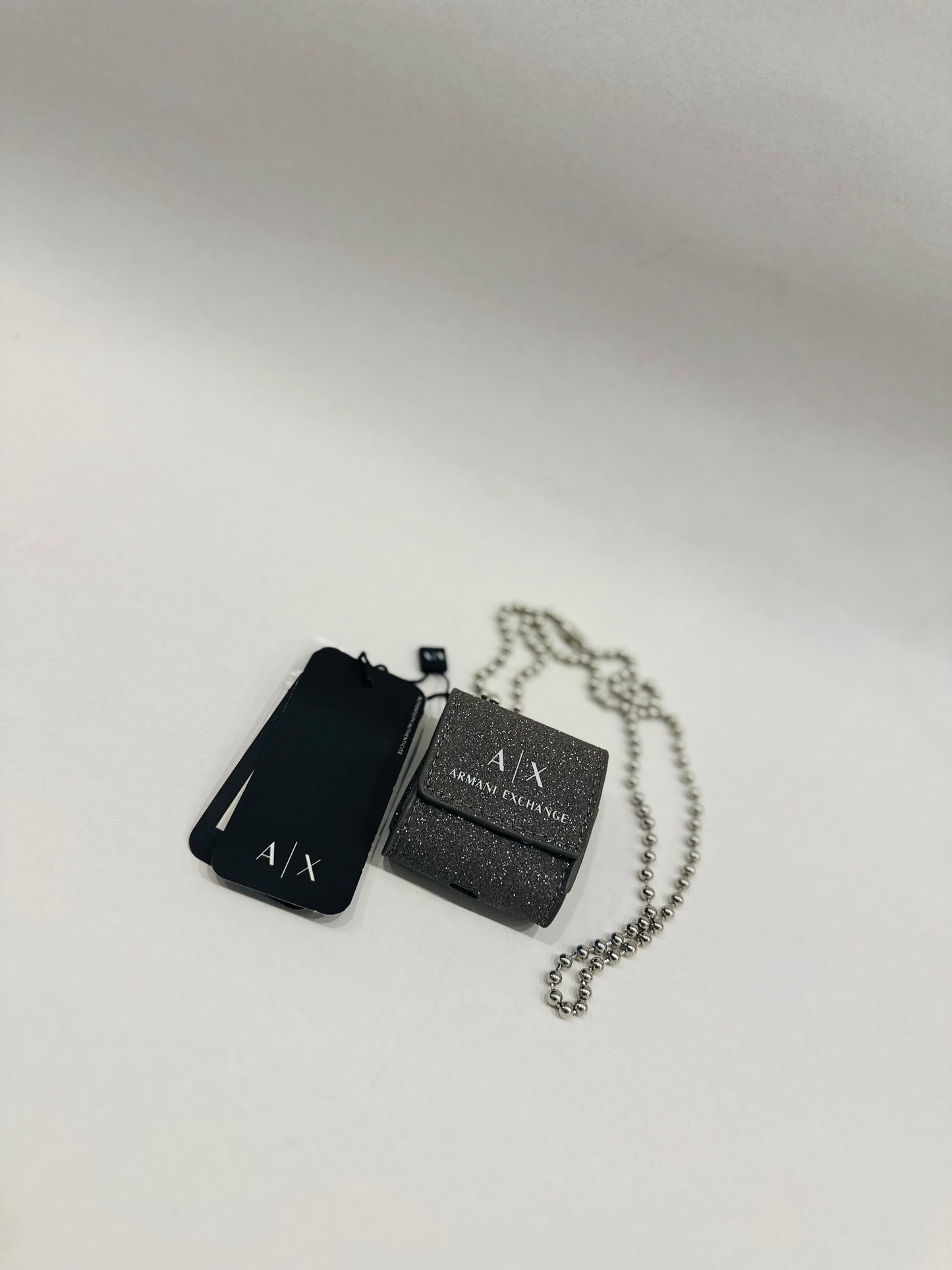 Armani exchange airpod case with belt