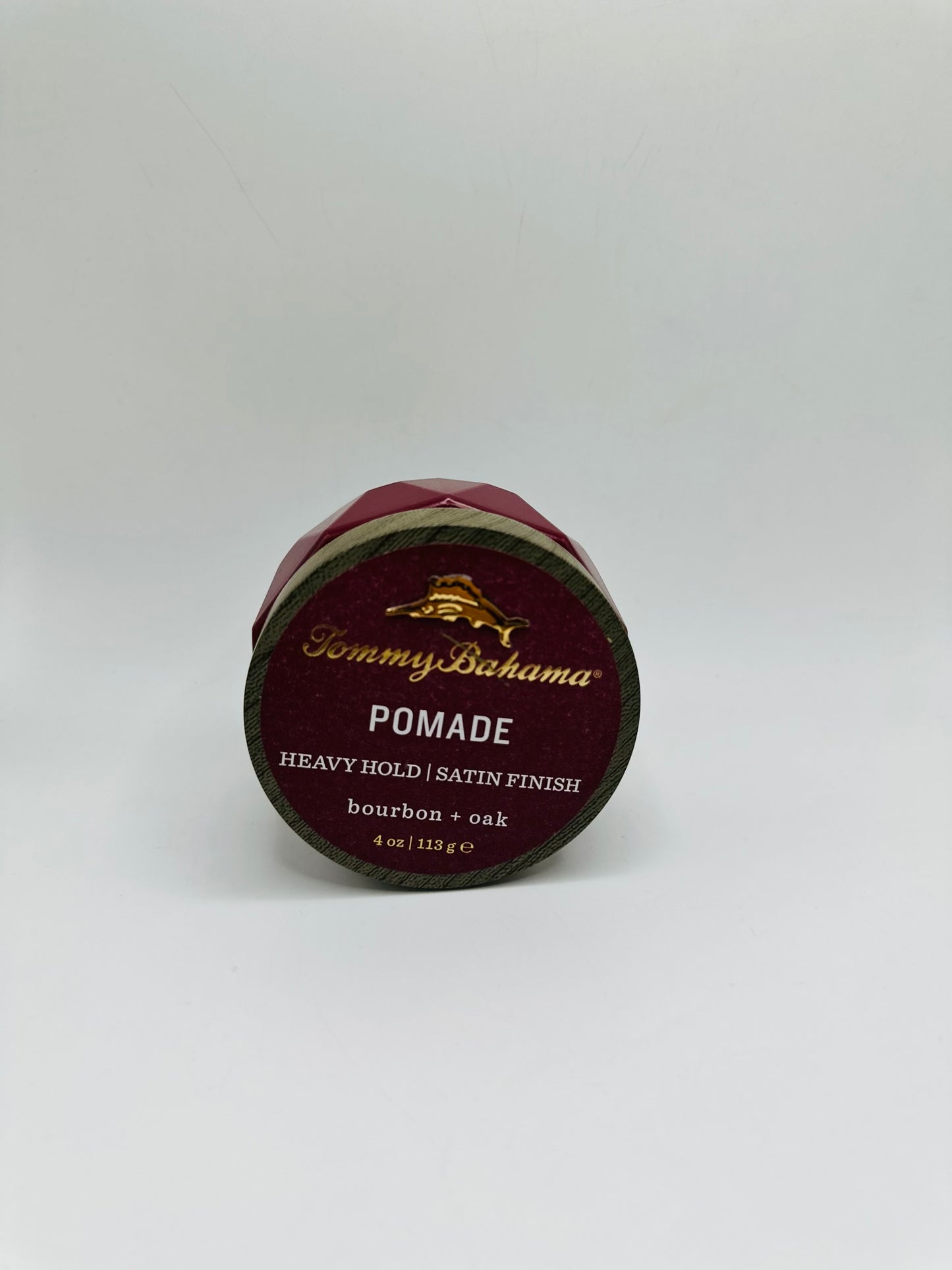 Tommy Bahama Heavy Hold Satin Finish Pomade, scented with bourbon and oak