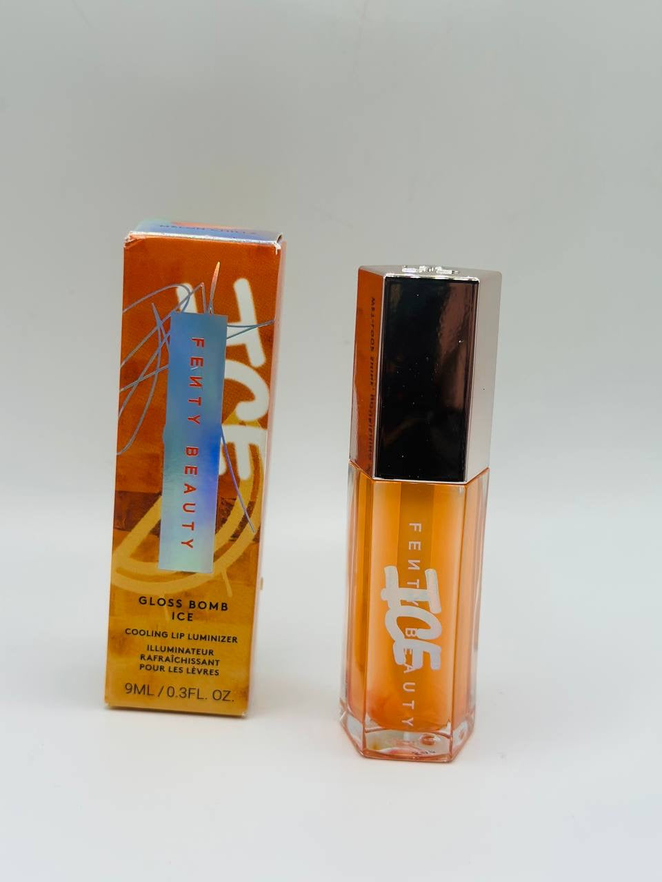 Fenty beauty gloss bomb ice shade melon chillz