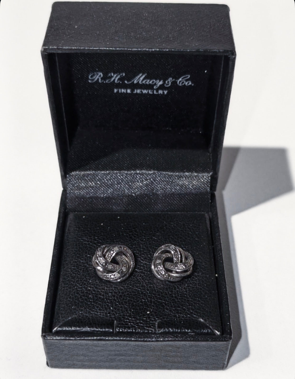 R.H. Macy & Co. sterling silver and diamond love knot stud earrings