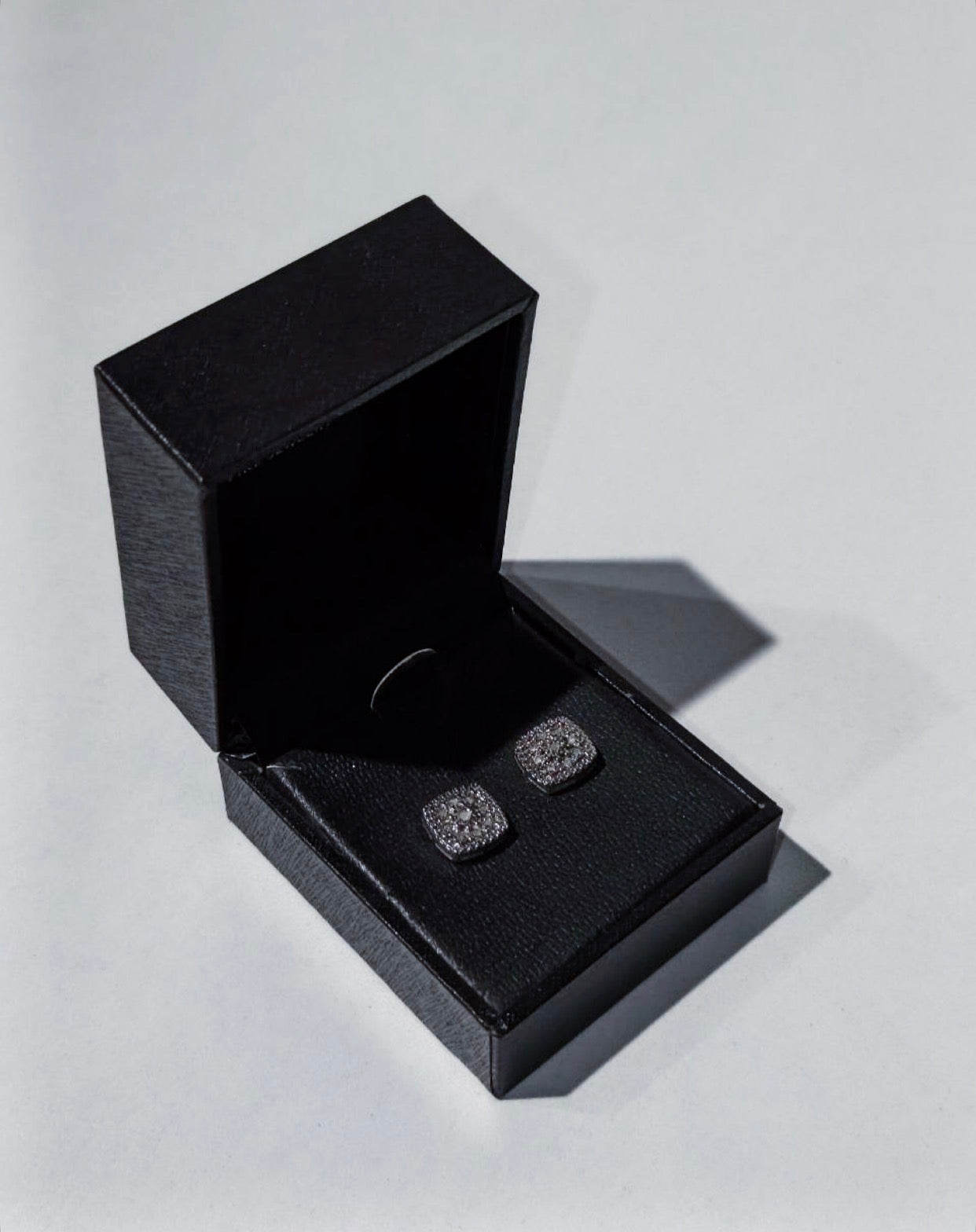 R.H. Macy & Co. sterling silver and pavé diamond cluster cushion stud earrings