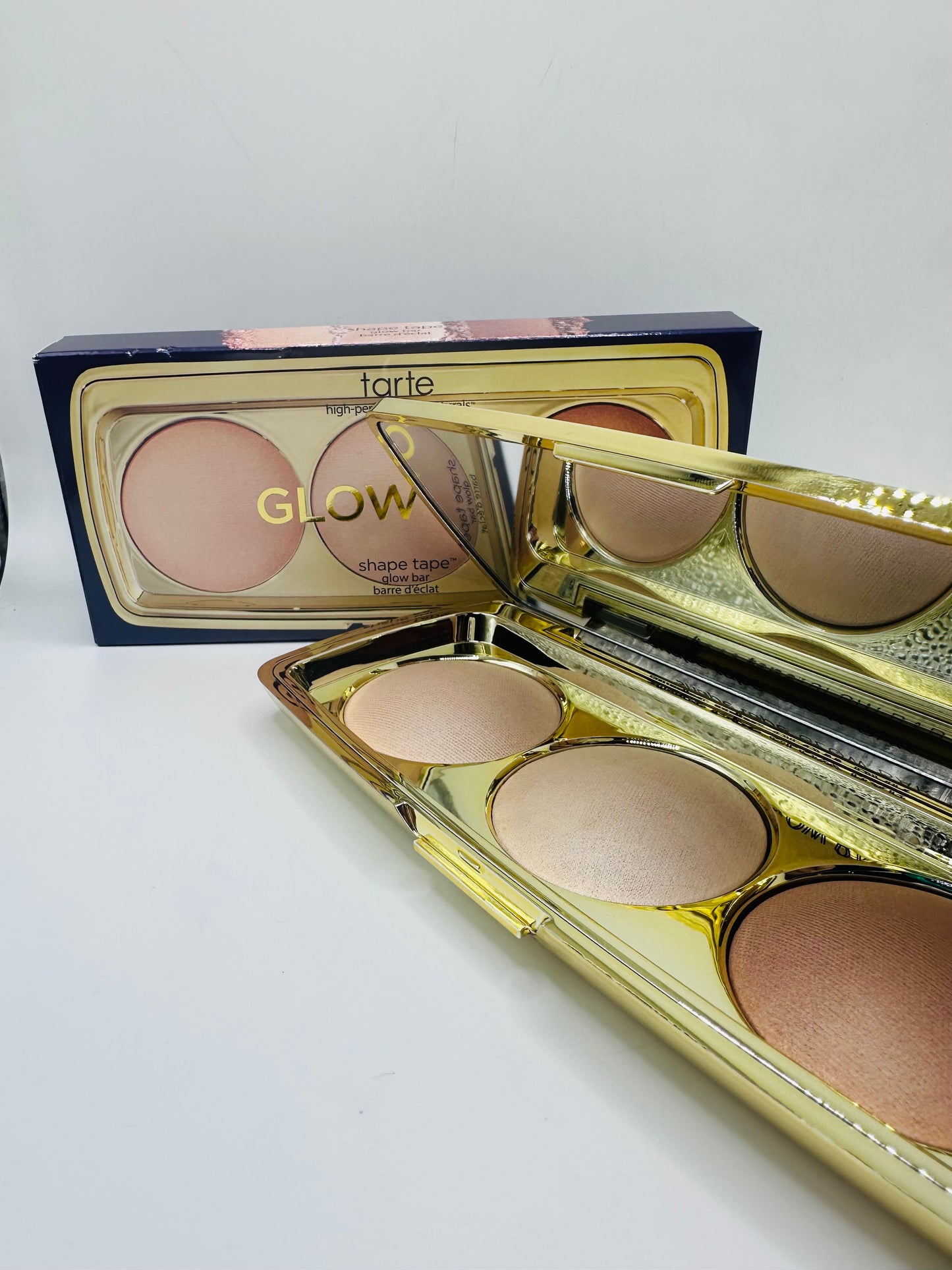 Tarte Shape Tape Glow Bar palette featuring three universal shades: Champagne Blur, Bronze Glow, and Sunlit Glow