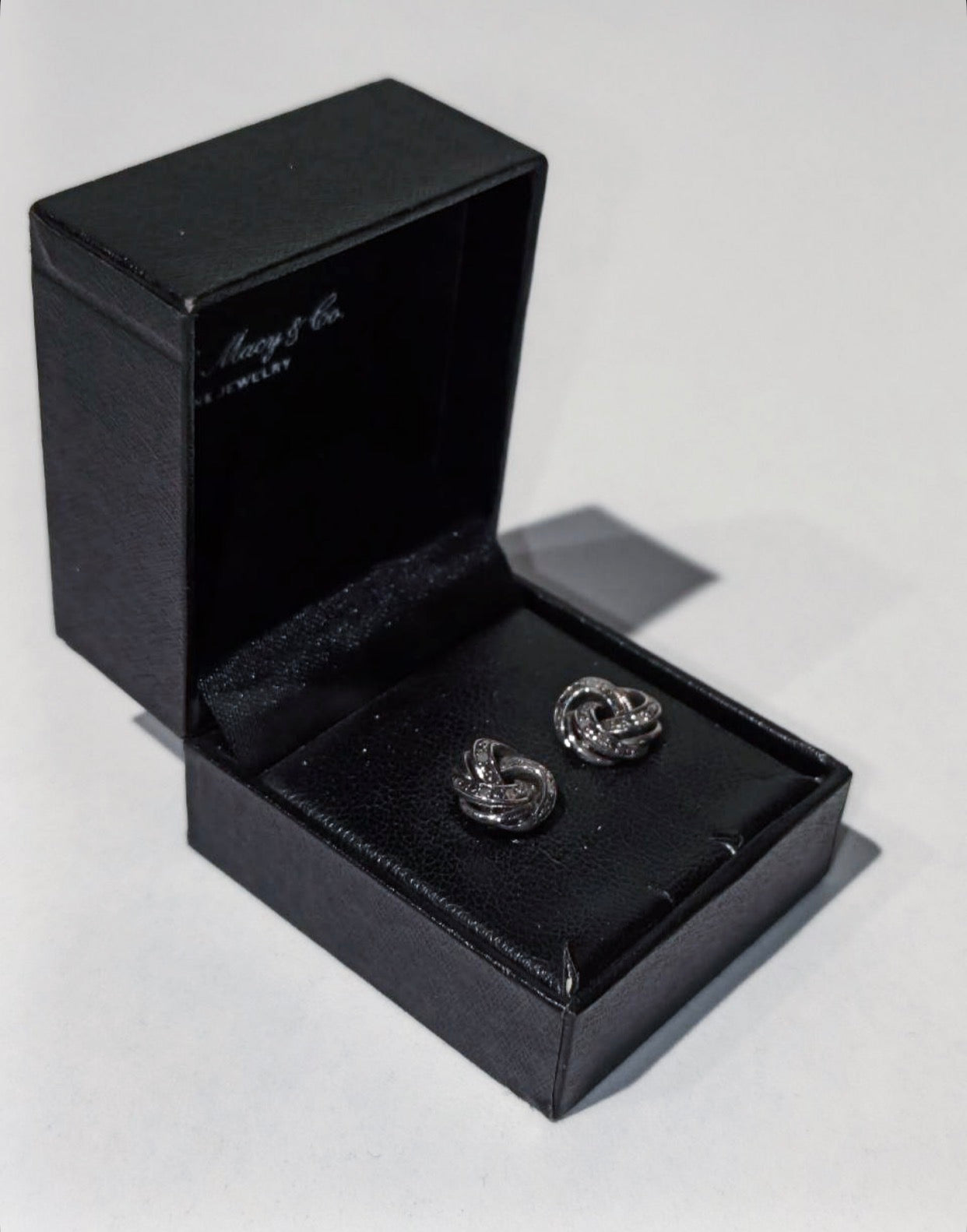 R.H. Macy & Co. sterling silver and diamond love knot stud earrings