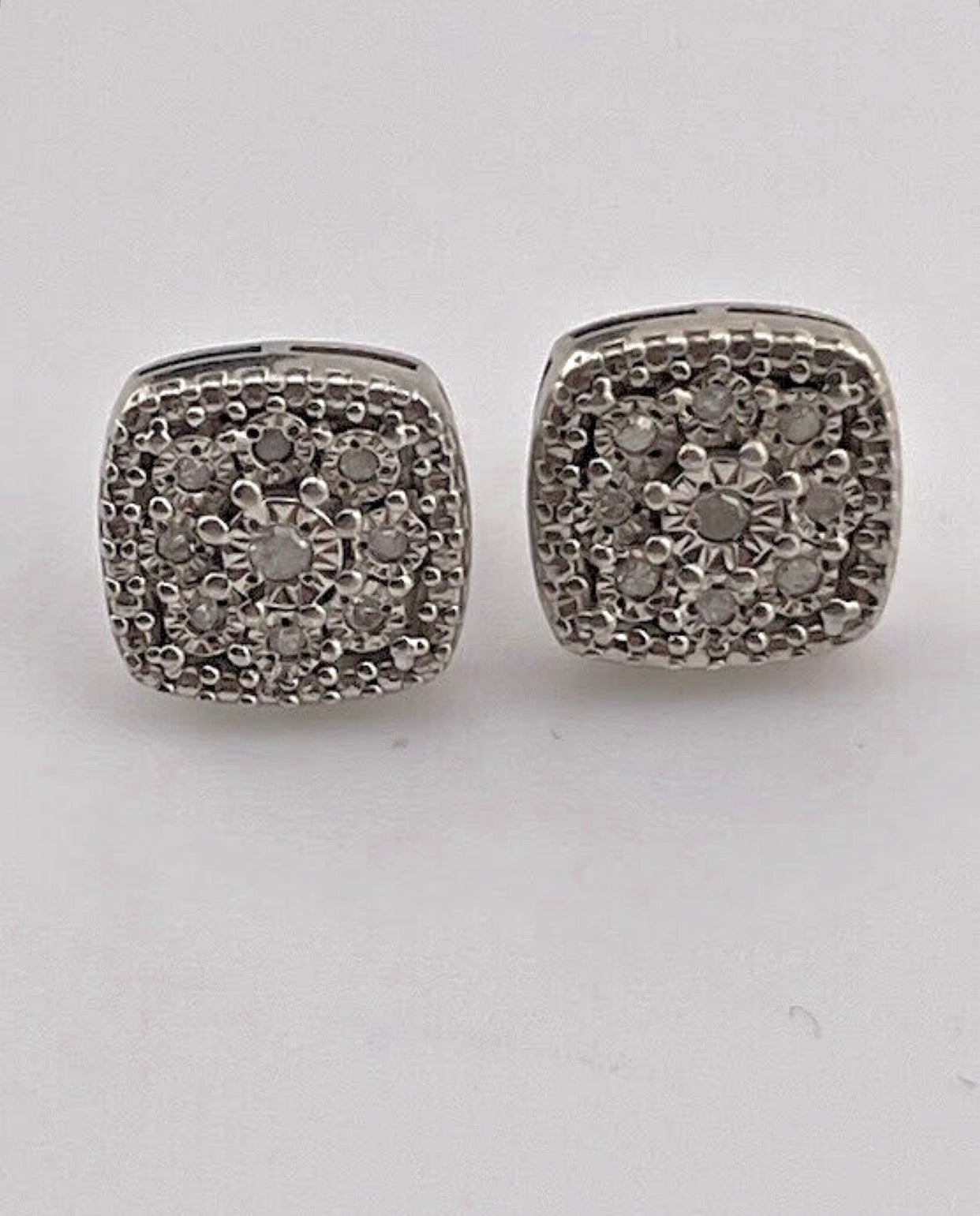 R.H. Macy & Co. sterling silver and pavé diamond cluster cushion stud earrings