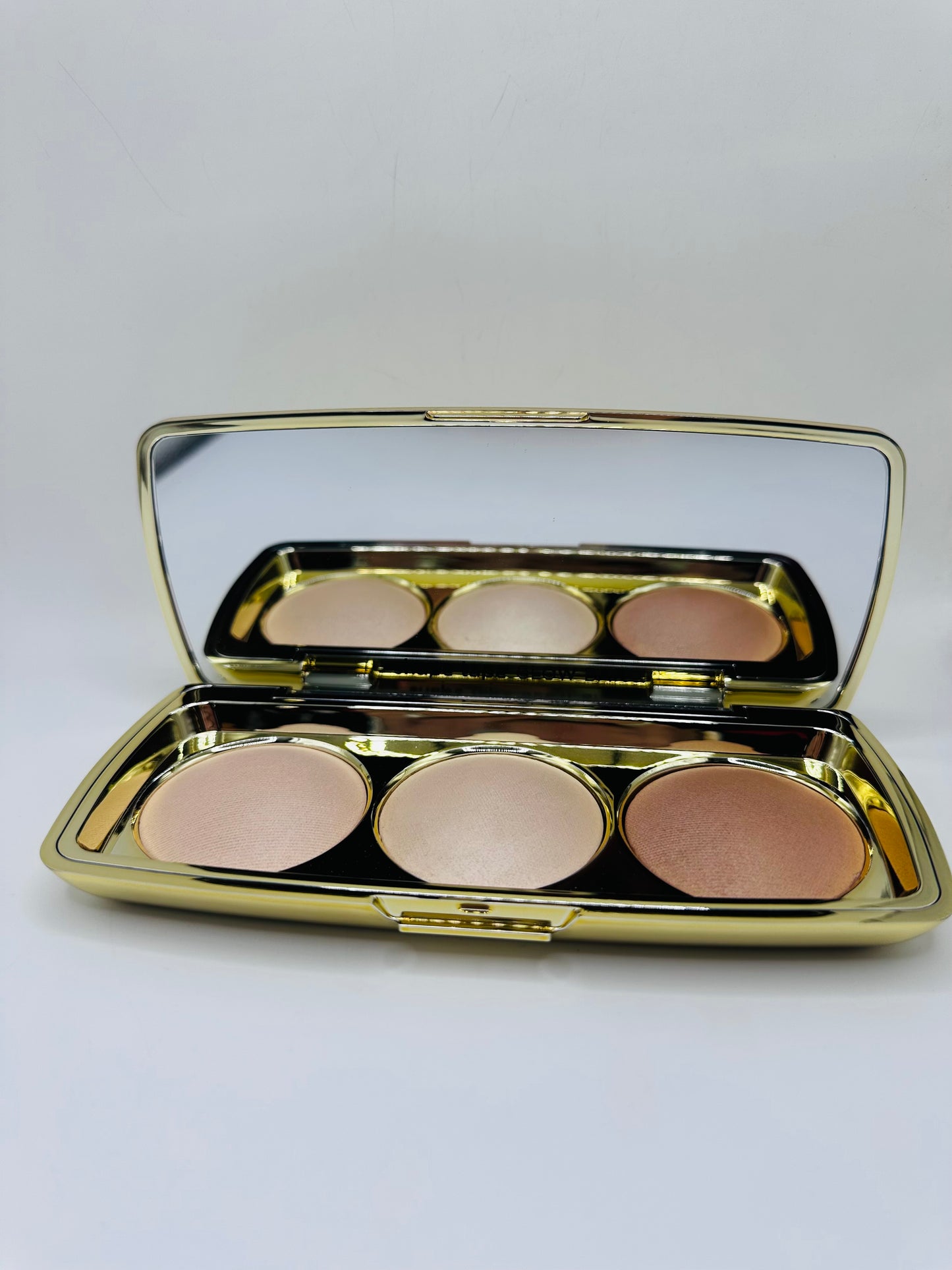 Tarte Shape Tape Glow Bar palette featuring three universal shades: Champagne Blur, Bronze Glow, and Sunlit Glow