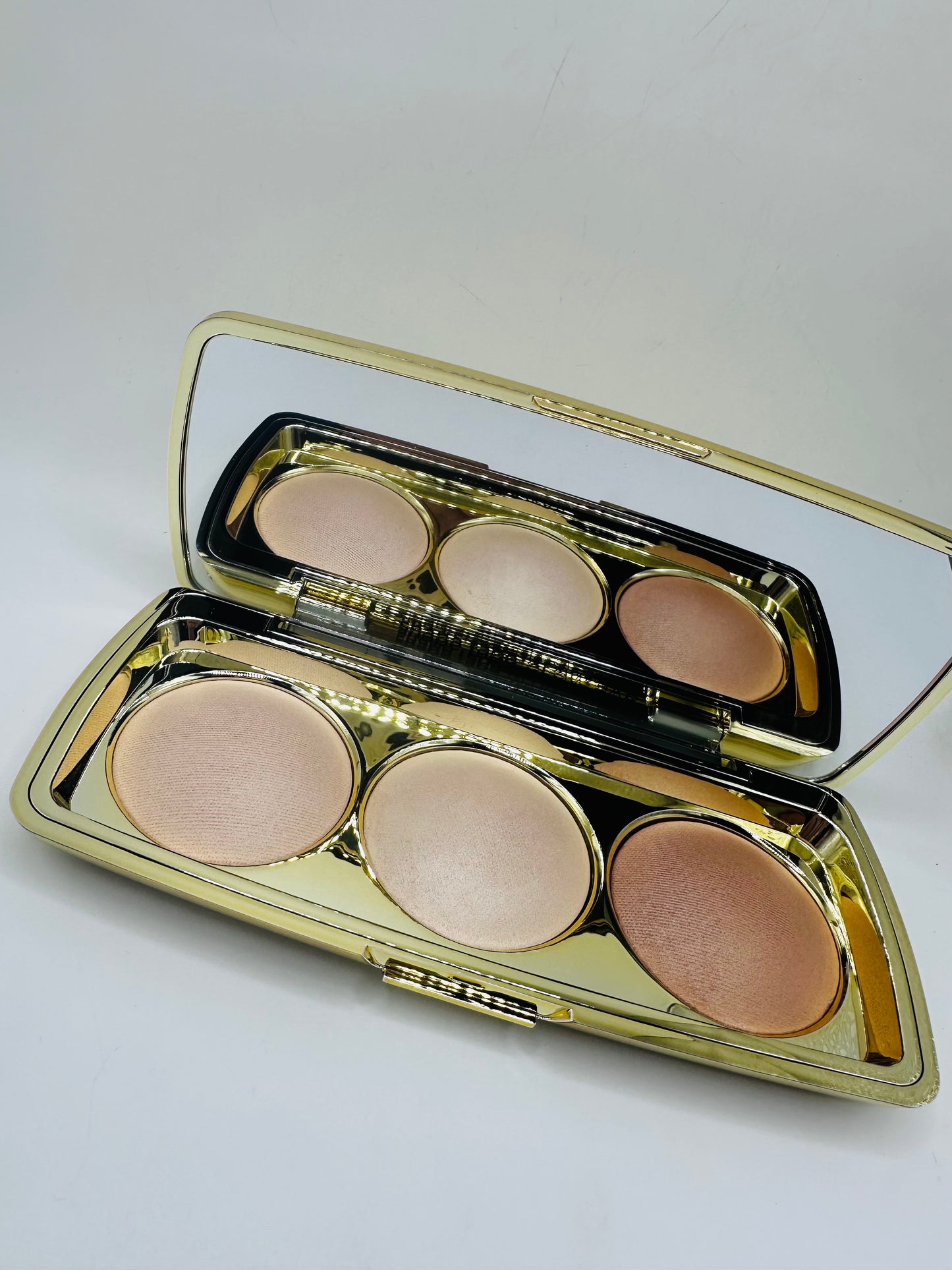 Tarte Shape Tape Glow Bar palette featuring three universal shades: Champagne Blur, Bronze Glow, and Sunlit Glow