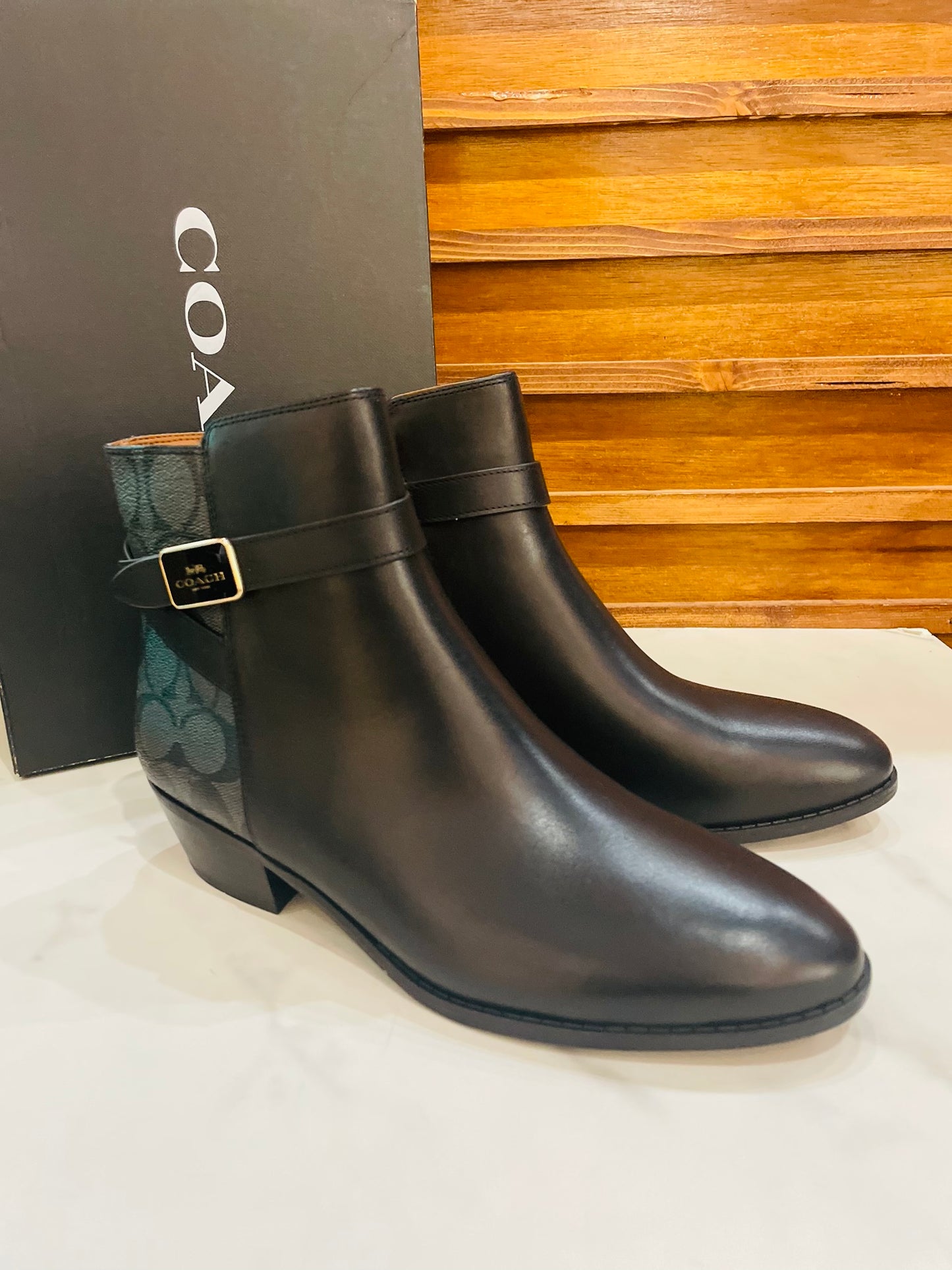 Coach black print boots