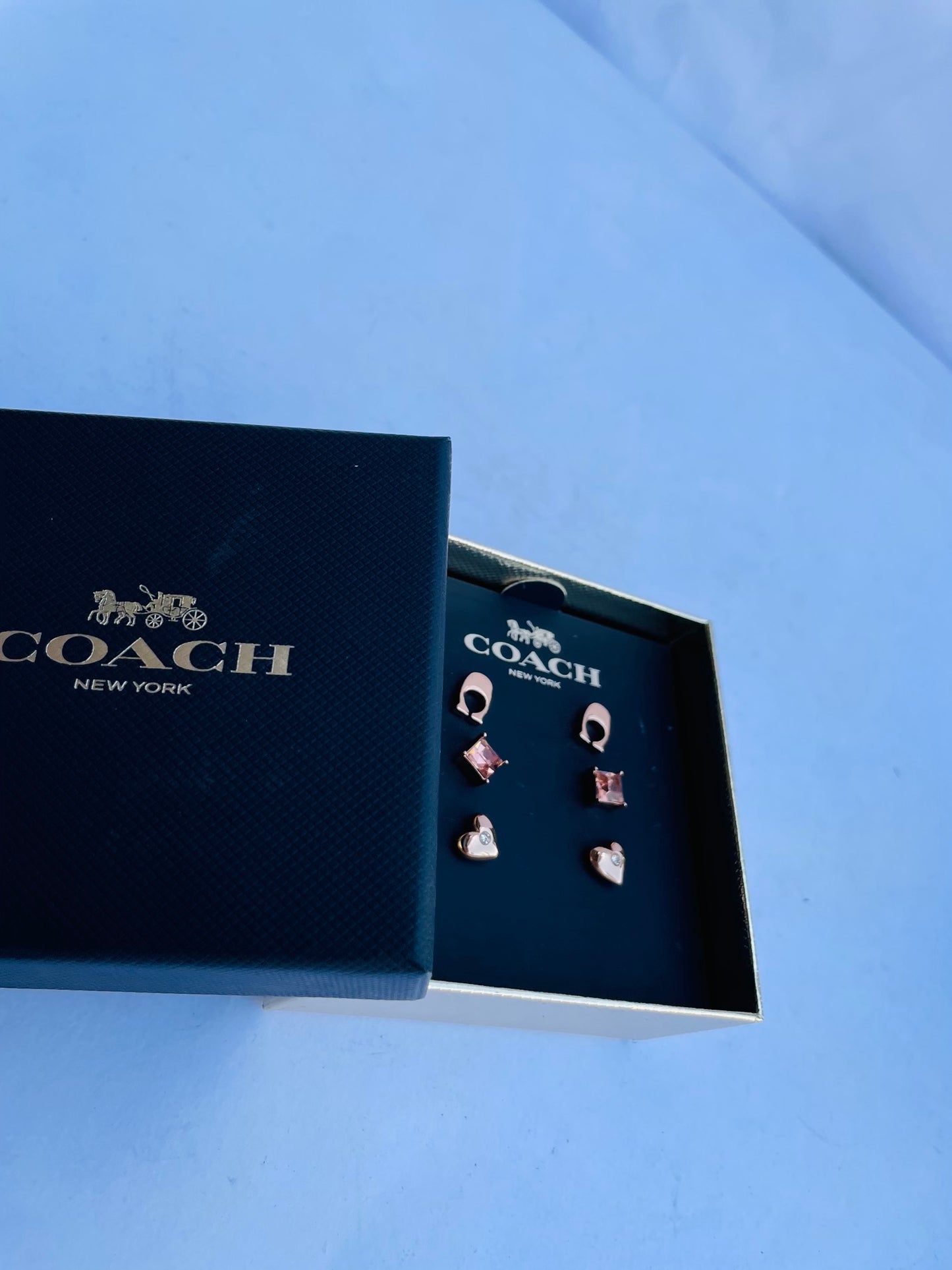 Coach earring sets