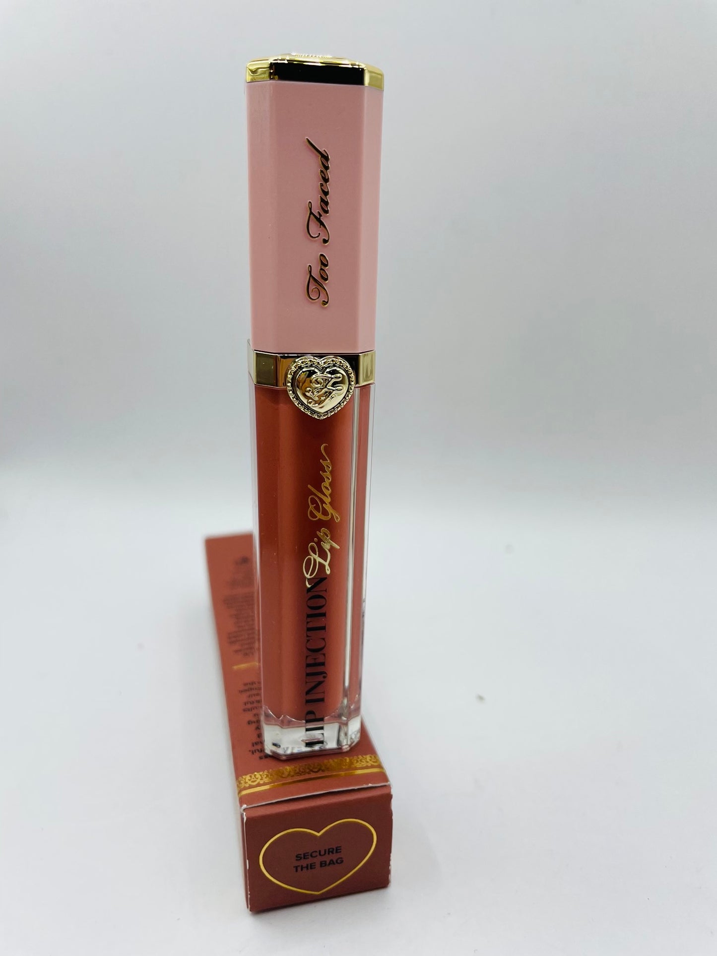 Too faced lip injection secure the bag