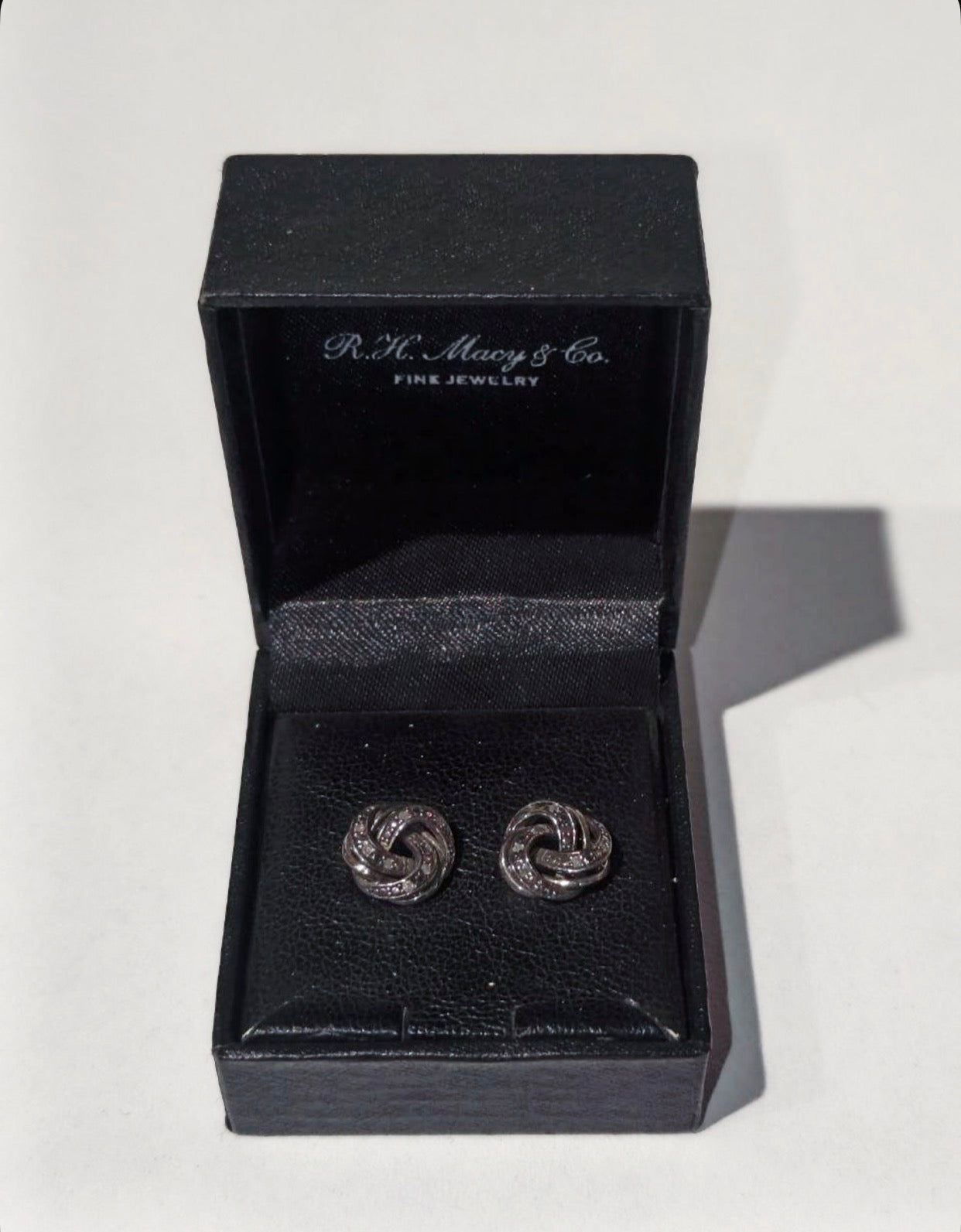 R.H. Macy & Co. sterling silver and diamond love knot stud earrings