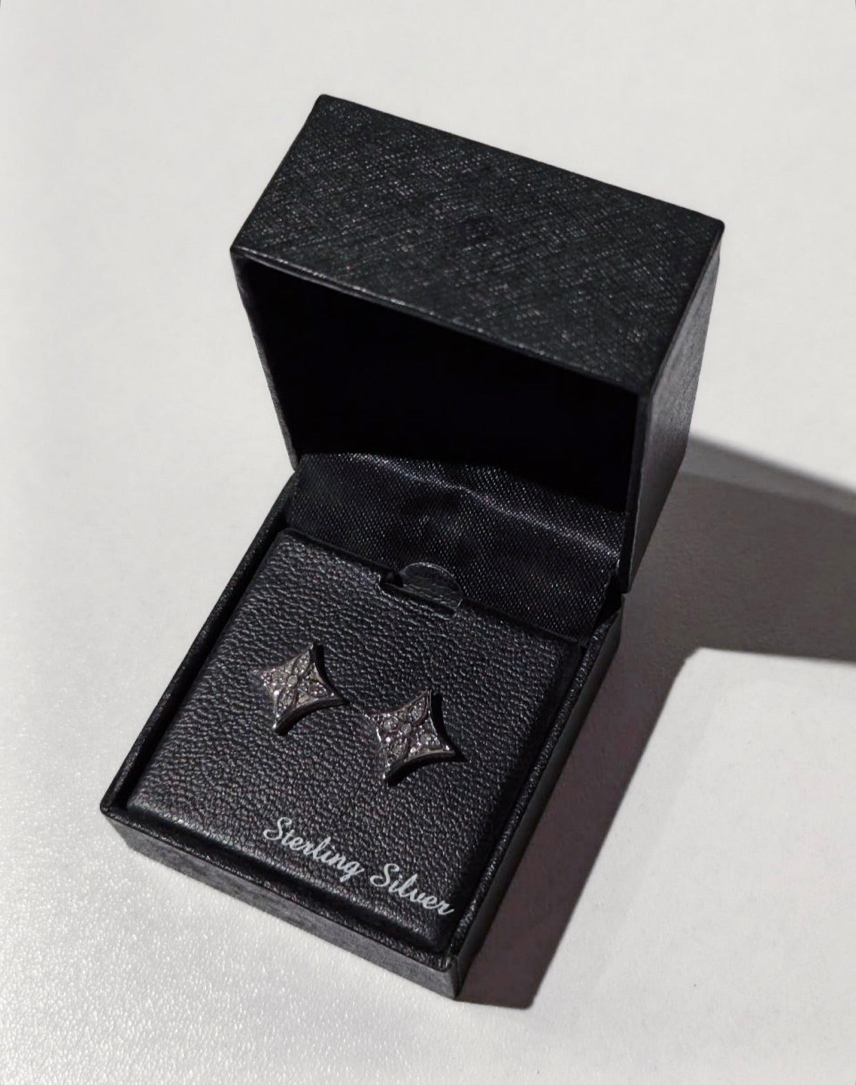 R.H. Macy & Co. sterling silver diamond Star Stud Earrings