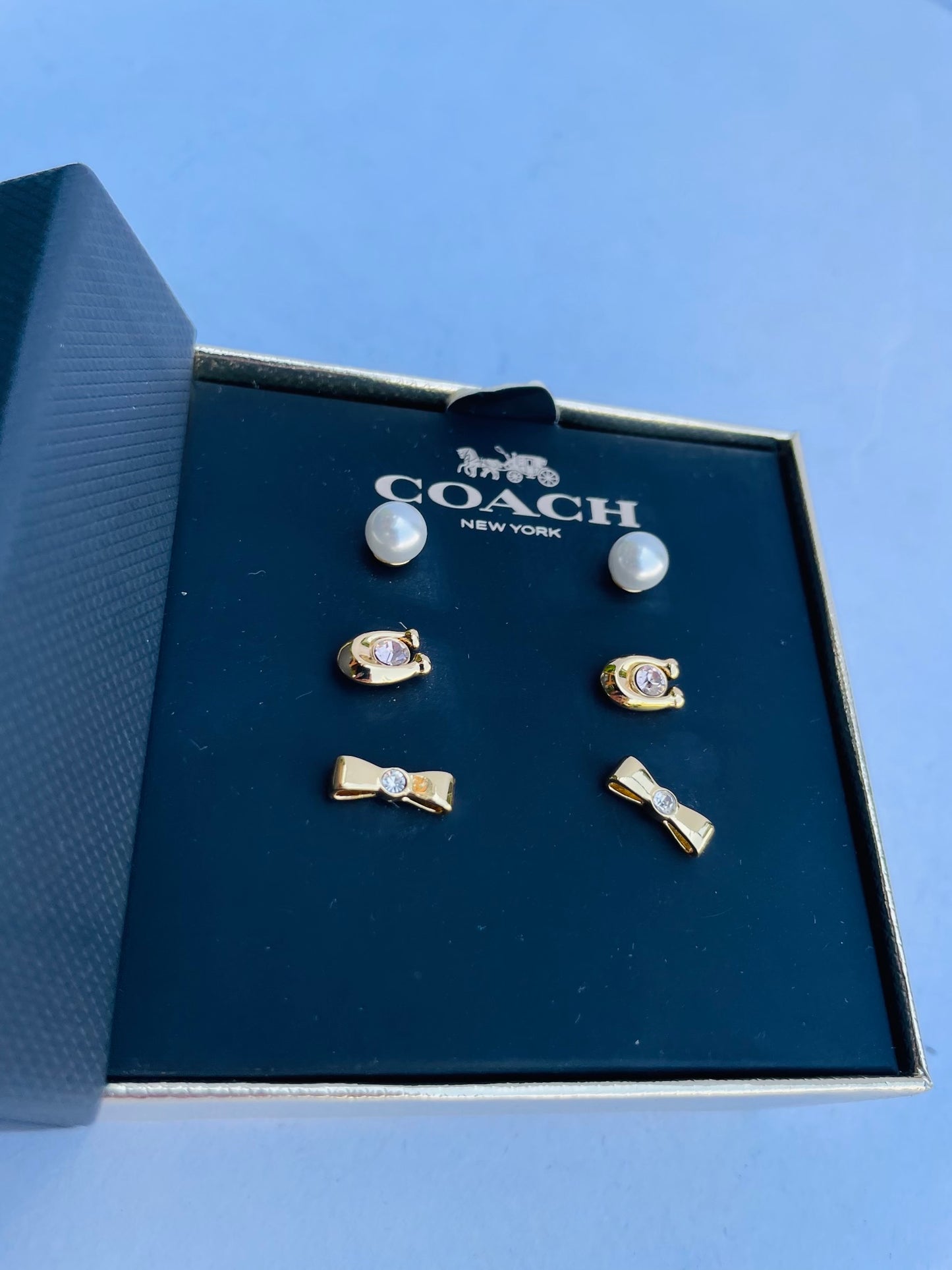 Coach earring sets